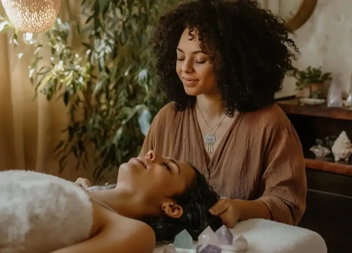 Spa therapist giving a client a relaxing treatment