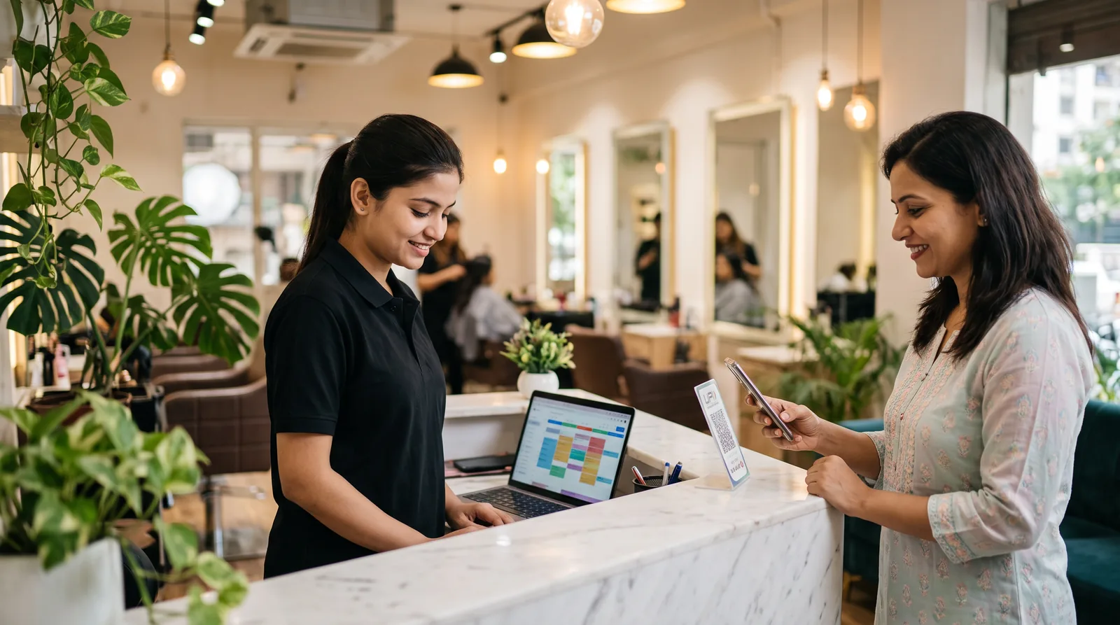 Salon receptionist billing a client on DINGG while the client pays by UPI at the front desk